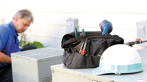 Service Tech Heating & Cooling Services — photo